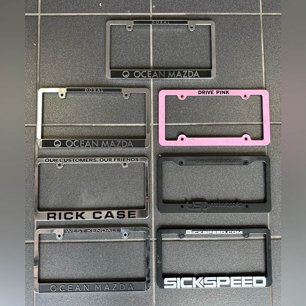 Set of 7 License Plate Covers.